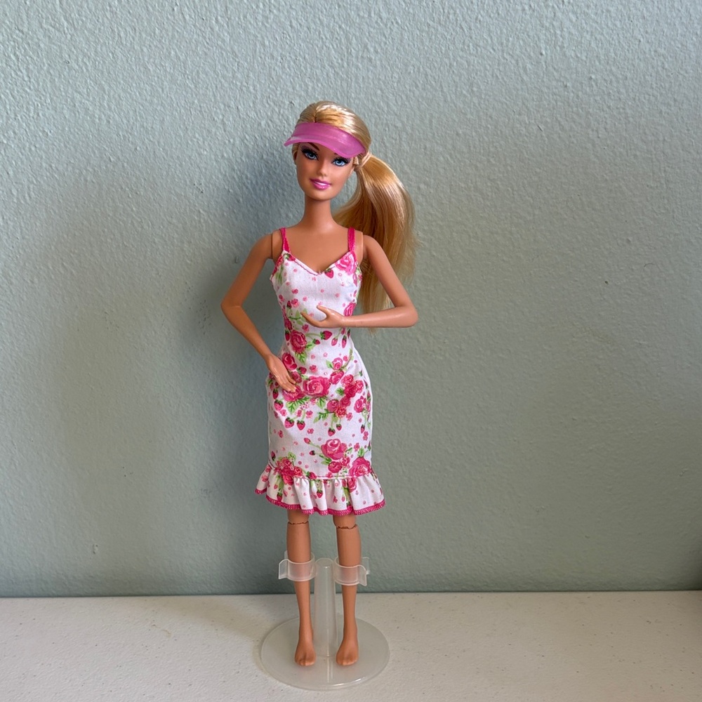 1999 Mattel Barbie Floral Dress with Pink Visor Articulated Knees